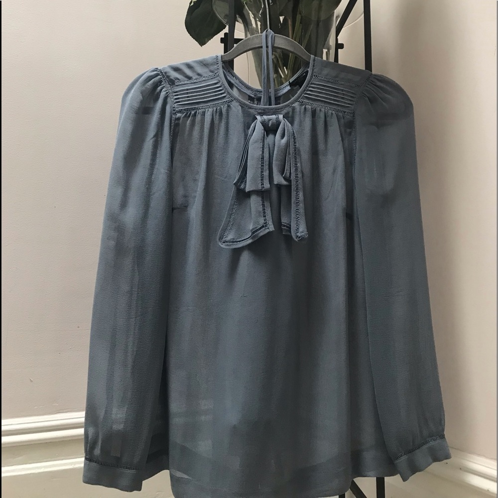 Ann Taylor silk blouse with the slip in size SP